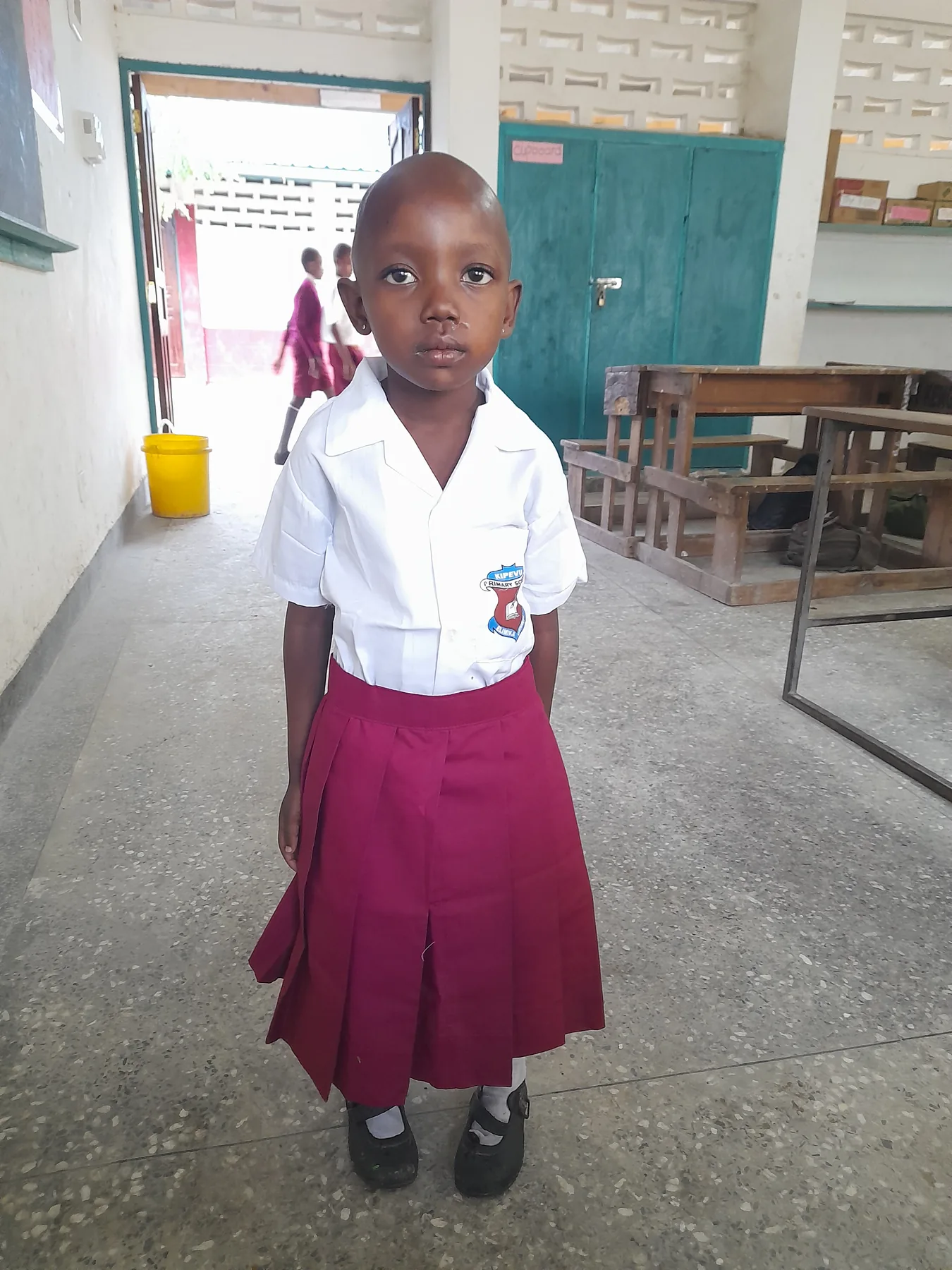 FRADAKI also supported a needy student in Mombasa county by purchasing for the student new neat scholol uniform.