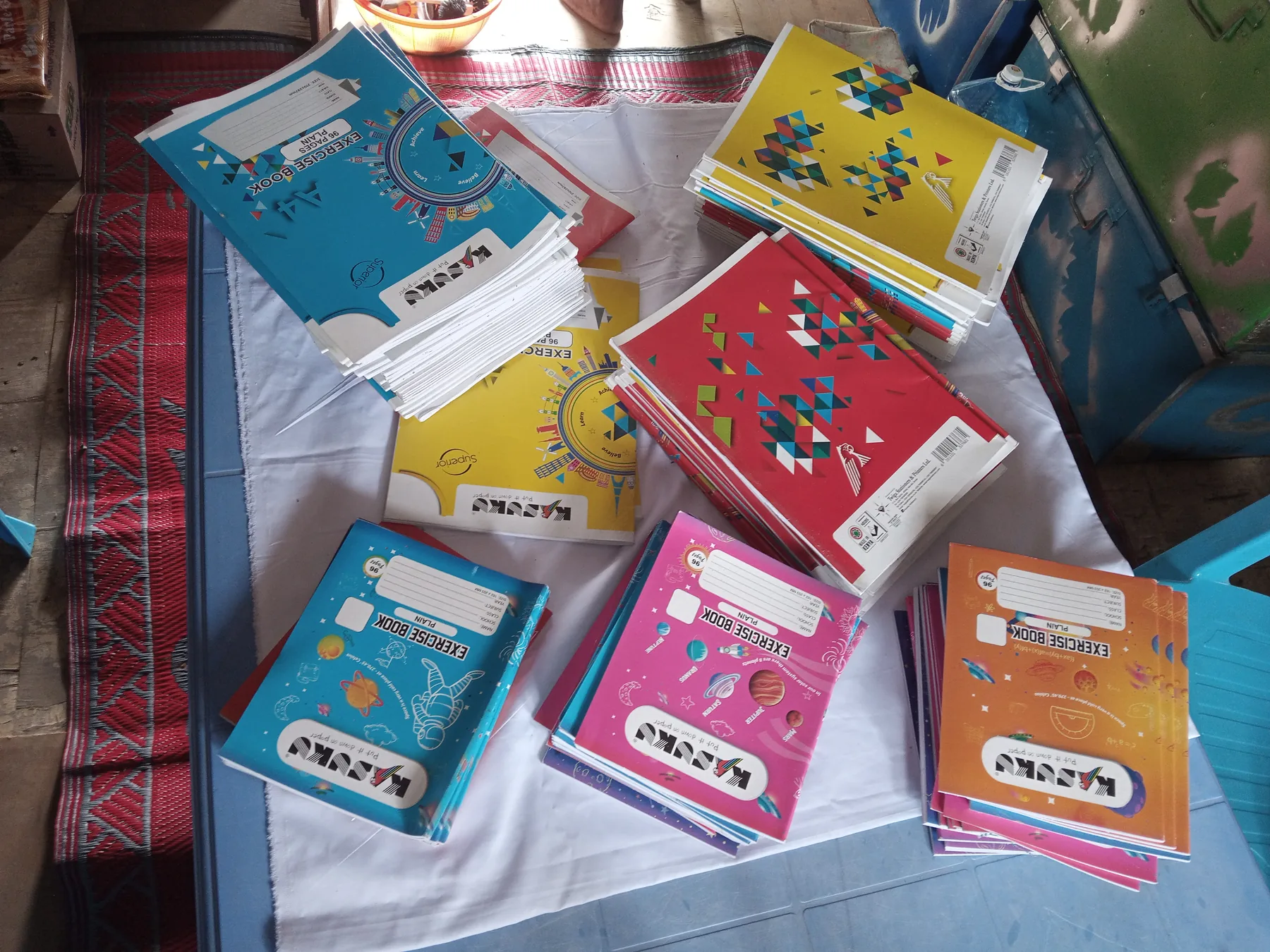 A display of exercise books that were handed over to the students at Ngiluni Primary School.