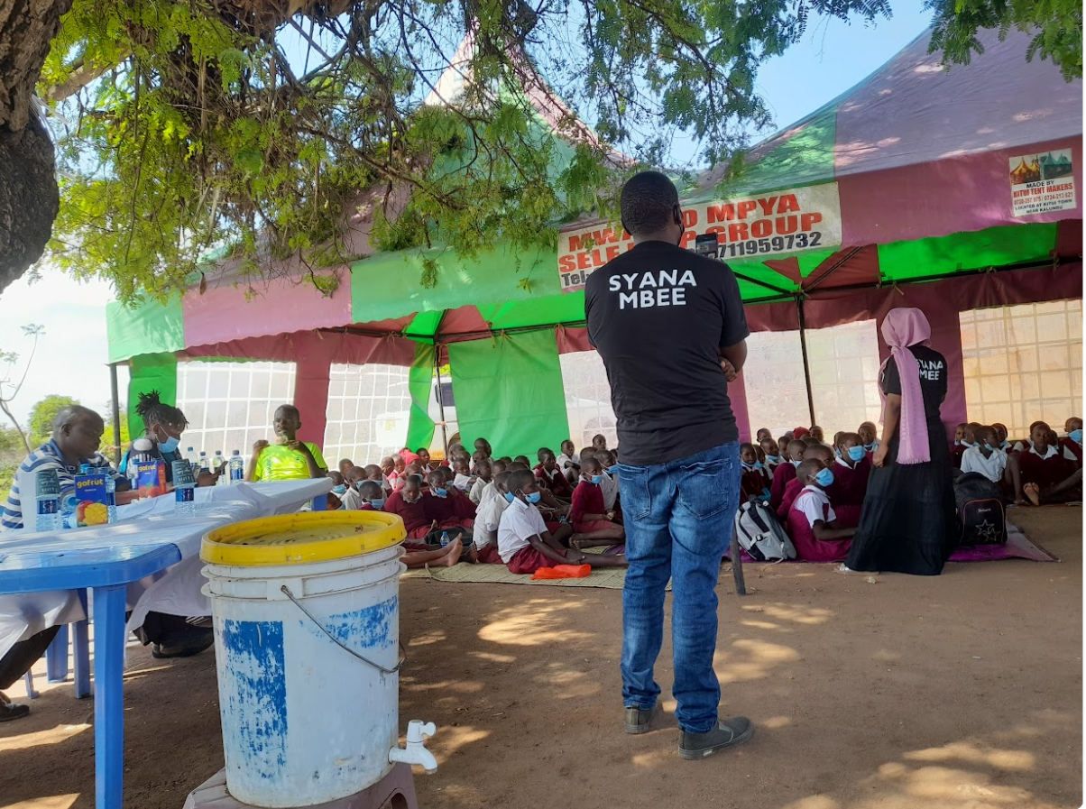 Ms Khadija Omar,Counselling Psychologist and a Probation Officer(Mpeketoni) in a guidance and counselling session with students from Ngiluni Primary.# FRADAKI